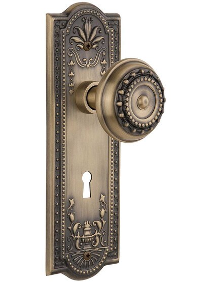 Meadows Door Set with Matching Knobs and Keyhole Single Dummy in Antique Brass.